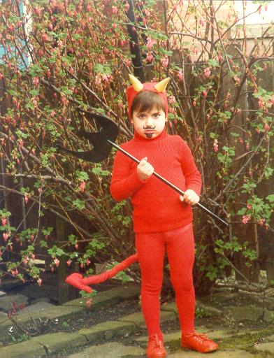little kid, in a devil costume